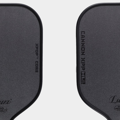Close-up of the LUZZ Cannon XPP M1 paddle face and XPOP Core markings