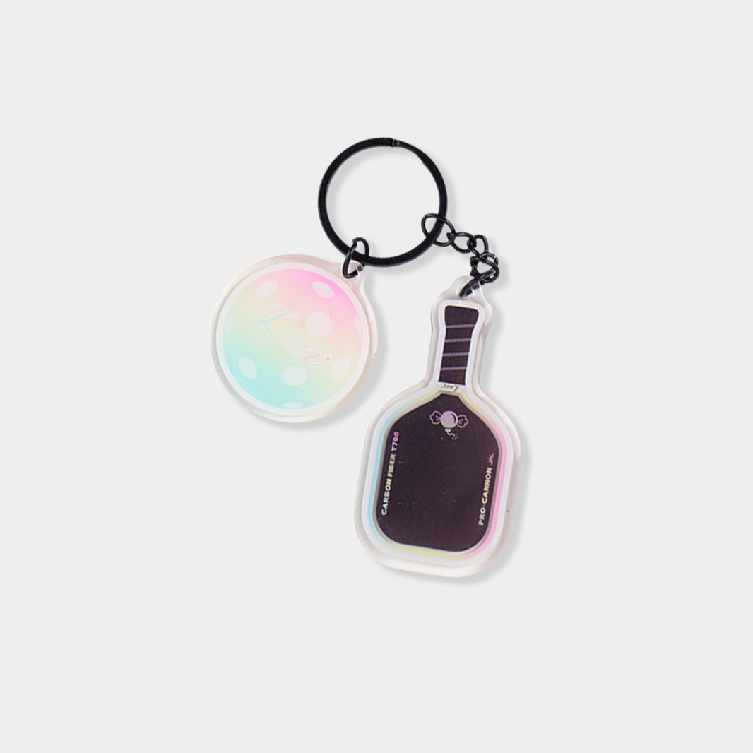 Acrylic pickleball paddle-shaped keychain with Candy Cannon design and glossy epoxy finish.