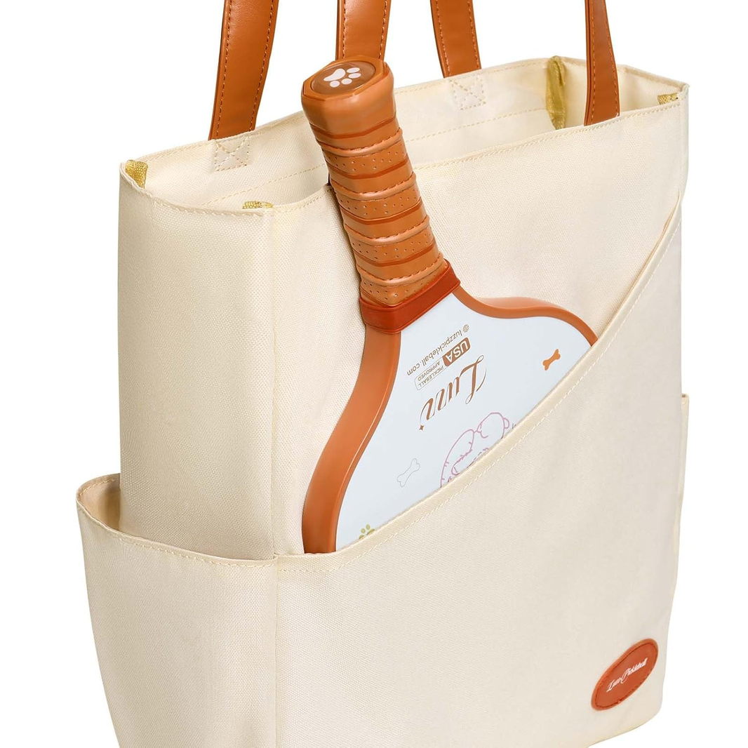 Side view of a pickleball bag with a paddle inserted into the dedicated paddle pocket