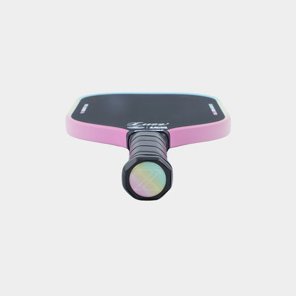 Paddle lying flat, perspective view with the handle base facing forward, featuring a candy-colored base with a cutout Z.