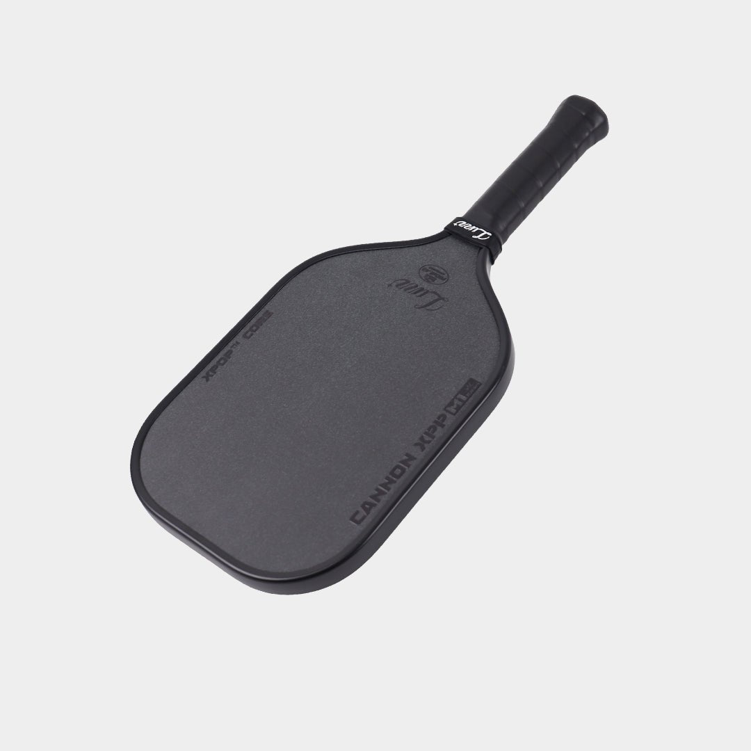Top-down angled view of the LUZZ Cannon XPP M1 black pickleball paddle
