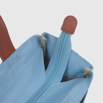 Close-up detail of the zipper pull on the Jean Blue pickleball bag.