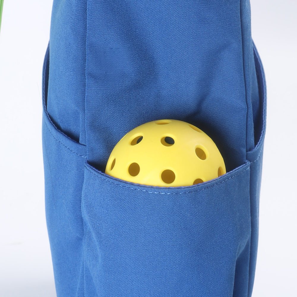 Close-up of the pickleball bag side pocket holding a pickleball