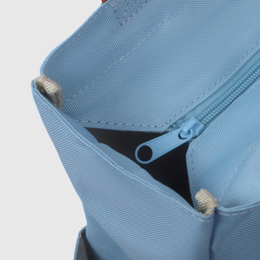 Close-up of the zipper pull detail on the Jean Blue pickleball bag.