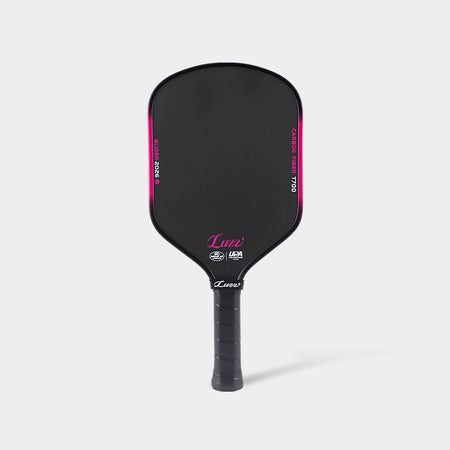 LUZZ Glider 2026 Hybrid Paddle featuring an all-black paddle face with black-to-pink gradient edges, pink-and-white “GLIDER 2026” and “CARBON FIBER T700” lettering on each side, a pink LUZZ logo and white UPA-A and USAP certification logos at the bottom, and a black handle