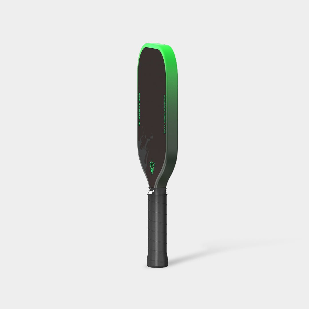 LUZZ Green Flame Cannon pickleball paddle upright right-side view featuring a green-to-black gradient side edge with black “TOXIC INCENDIARY” lettering and a black handle