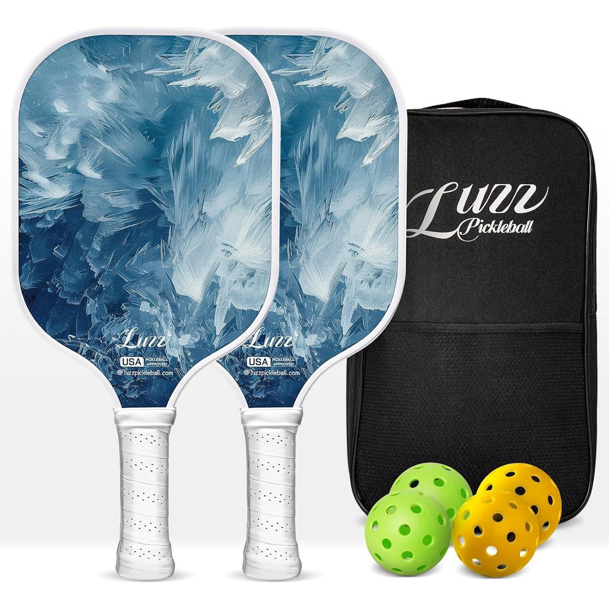 Two paddles arranged front and back, featuring oil painting-style iceberg landscape designs on the paddle faces and white handles. A black paddle bag, two indoor balls, and two outdoor balls are placed on the right side of the paddles.