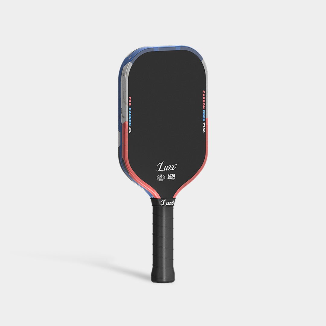 LUZZ Iron Cannon pickleball paddle upright left-side view featuring a solid black paddle face, blue-gray-orange color-blocked side edge, and black handle