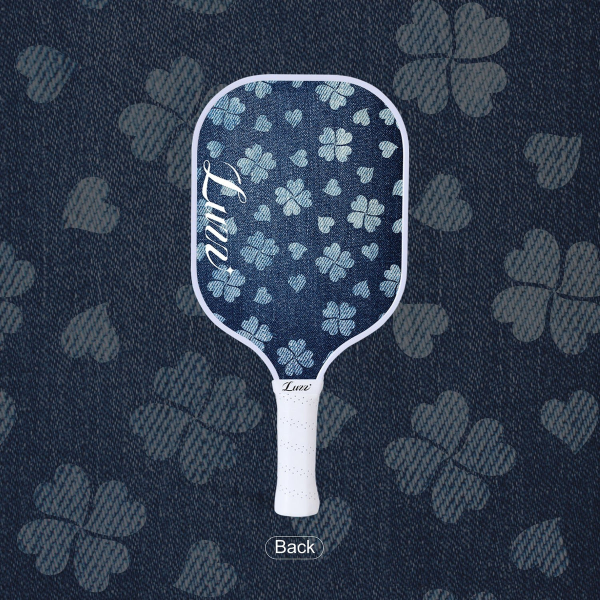 LUZZ Lucky Denim Original Paddle back view featuring a denim-blue paddle face with a four-leaf clover graphic and a script LUZZ logo on the left side