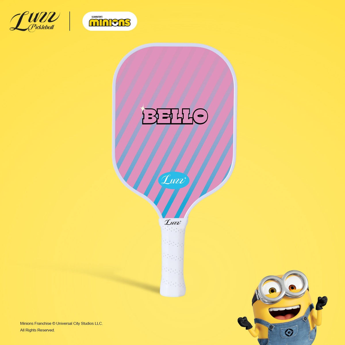 Minions collaboration Bad Choices pickleball paddle back view featuring a pink paddle face with blue stripes, centered “BELLO” text, and LUZZ logo below