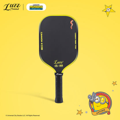 Front view of a pickleball paddle on a yellow background, featuring a yellow LUZZ logo and UPA-A and USAP certification logos