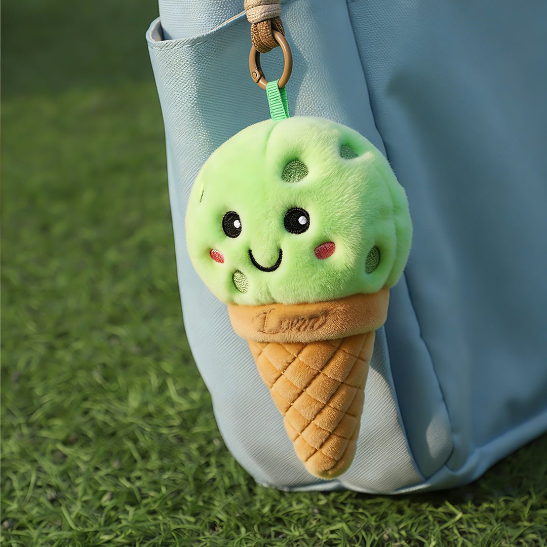 LUZZ Cute Ice Cream Plush Charm hanging from a pickleball bag