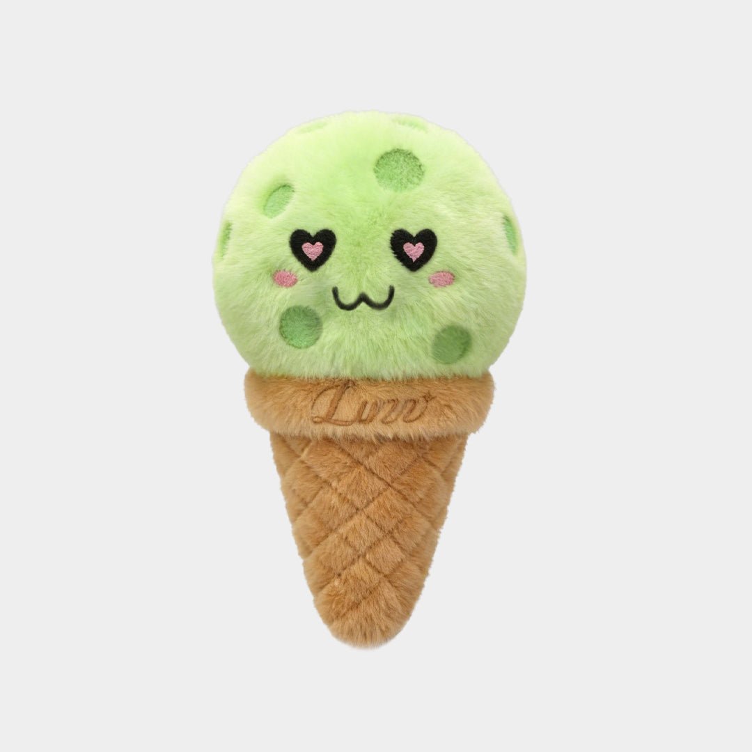 LUZZ Heart-Eyes Ice Cream Plush Charm featuring a green ice cream scoop, brown cone-shaped base, stitched LUZZ logo, and brown hanging cord