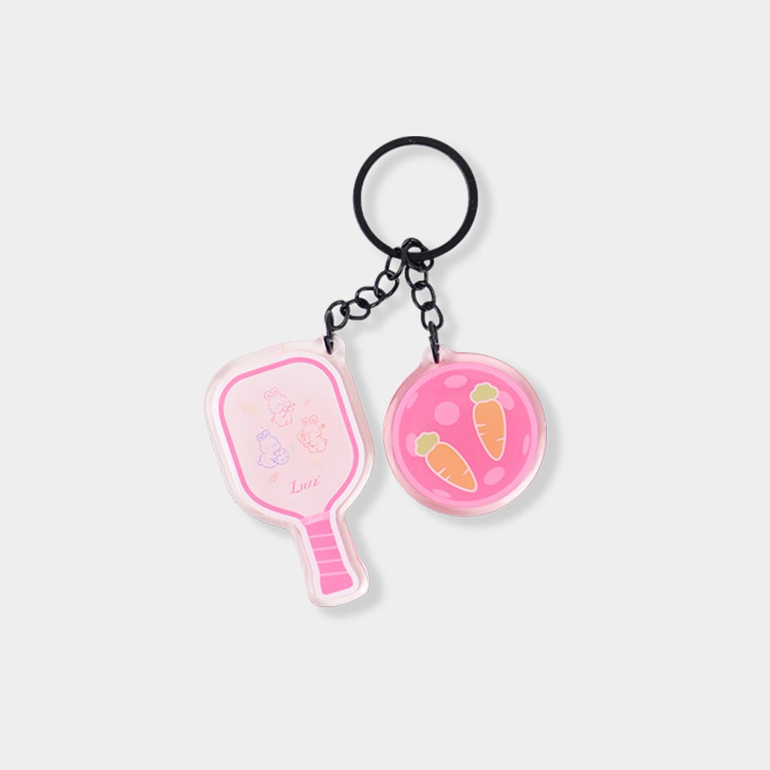 Acrylic pickleball paddle-shaped keychain with Bunny design and glossy epoxy finish.