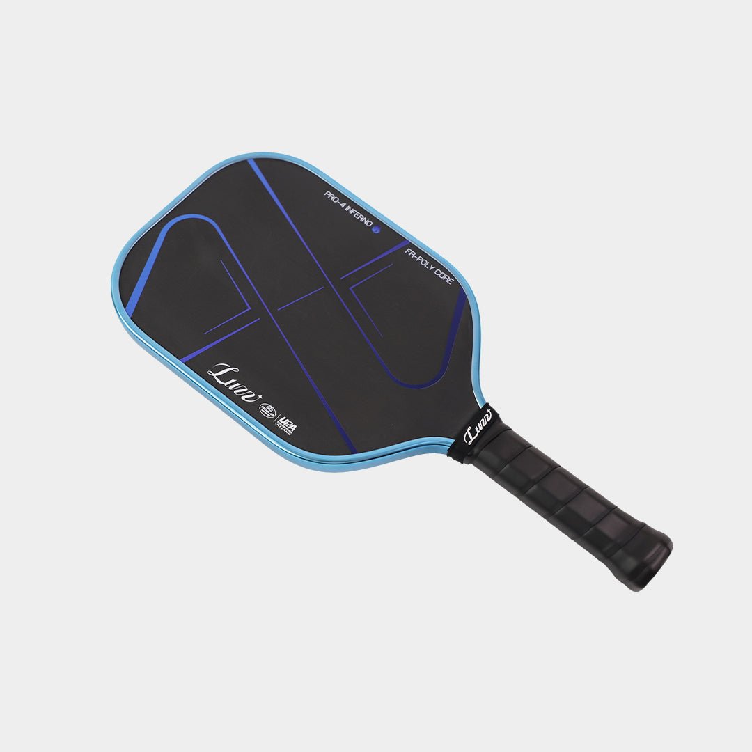 Flat-lay angled view of the paddle, featuring a light blue edge.