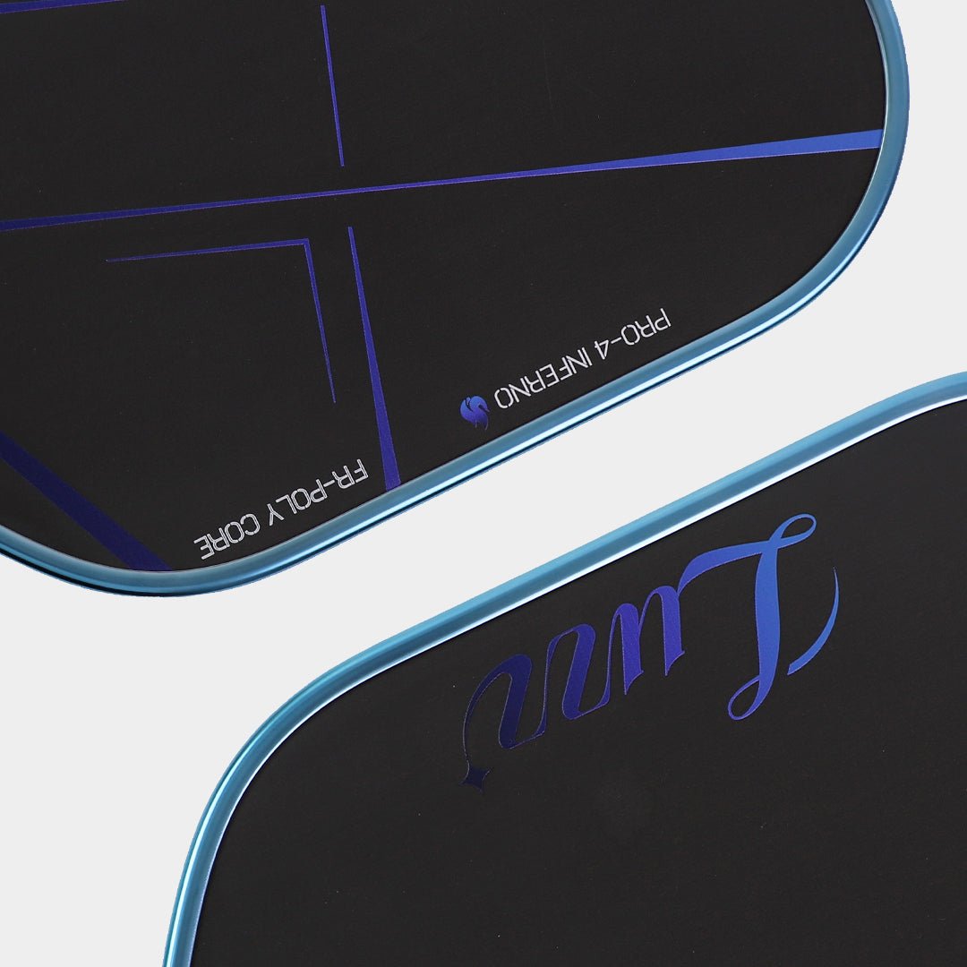 Close-up of the paddle face, showing a black face with blue lines and another black face with a blue Luzz logo.
