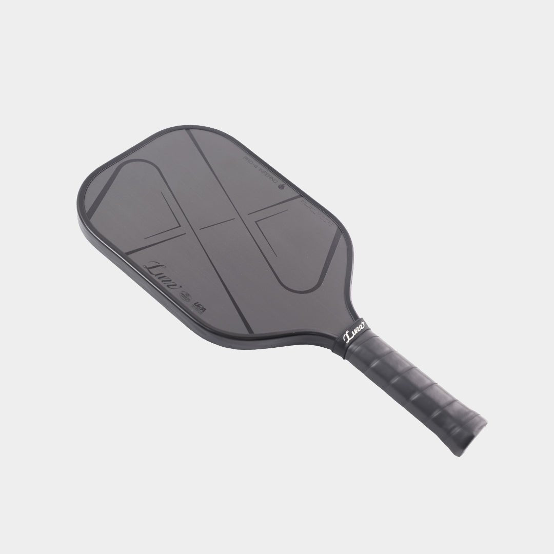 LUZZ Pro 4 Darkness Inferno pickleball paddle angled view featuring a solid black paddle face with glossy black line details, black paddle edges, and a black handle