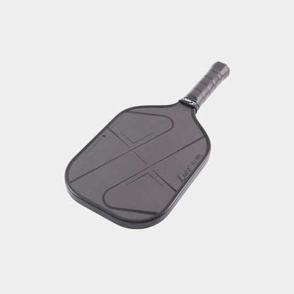LUZZ Pro 4 Darkness Inferno pickleball paddle angled with the paddle head facing forward, featuring glossy black LUZZ logo and UPA-A and USAP certification logos along the left edge of the paddle face, and glossy black “PRO-4 INFERNO” and “FR-POLY CORE” lettering along the right edge