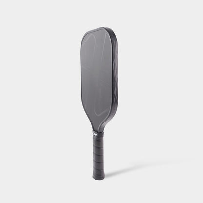 LUZZ Pro 4 Darkness Inferno pickleball paddle upright angled side view featuring a black paddle edge with gray flame graphics
