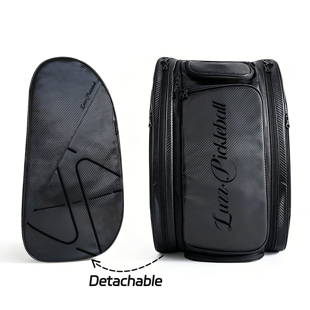 Black pickleball backpack with a detachable side pouch, featuring a black LUZZ logo and minimalist line details