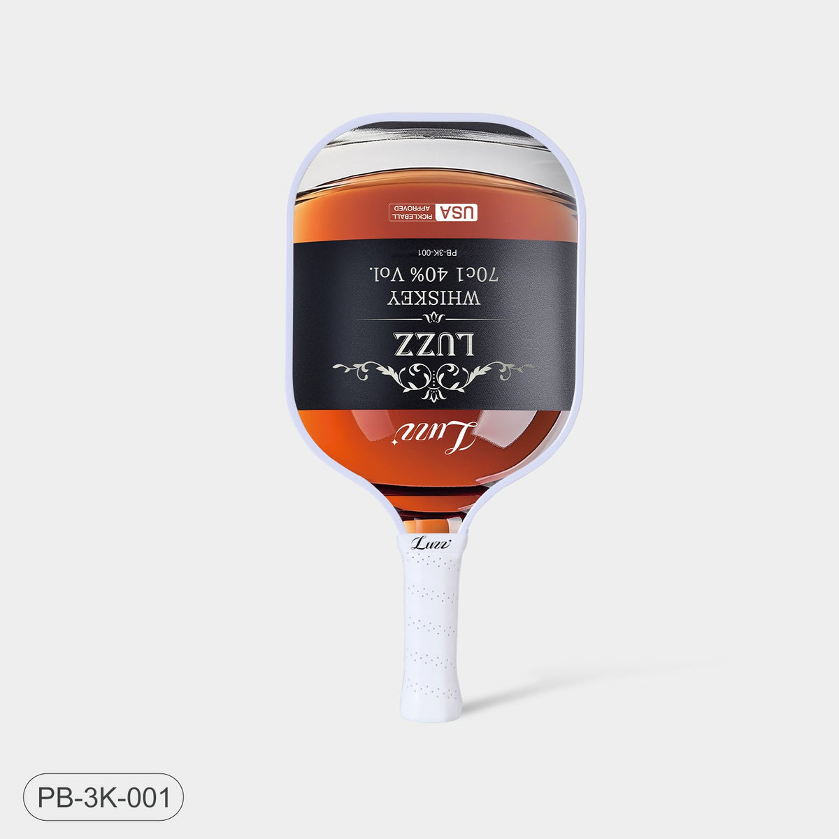 Luzz Whiskey Original Paddle standing upright, front view, featuring a liquor bottle-shaped face with a Luzz logo in the center, USAPA certification logo at the top, white edge, and white handle.