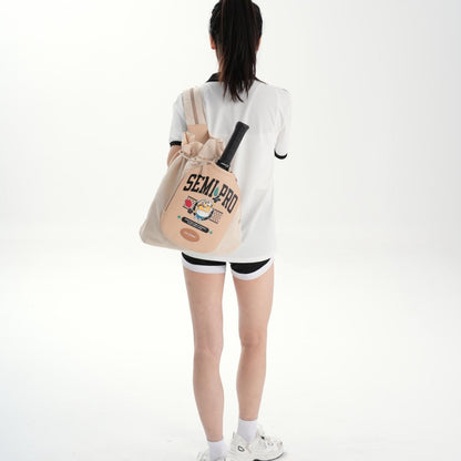Single-shoulder carry view of the Beige LUZZ Minions Collaboration Pickleball Backpack