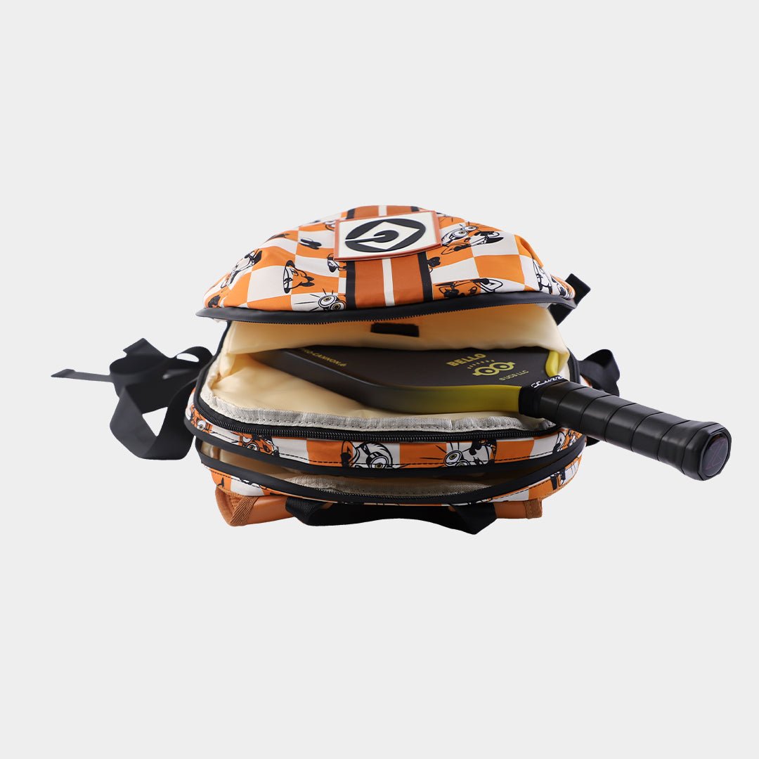 Flat-lay view of the pickleball backpack with zippers open, featuring two main compartments, an interior organizer pocket, and a paddle stored diagonally